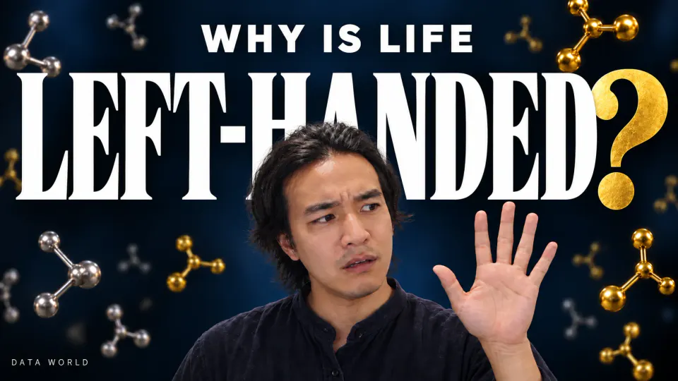 Why is life left-handed? Against a deep navy background, giant white letters read "LEFT-HANDED" with a gold question mark. In front of them, DATA WORLD editor-in-chief Kaito Ogasawara holds up his open left hand toward the camera with a puzzled frown. Gold and silver molecule models float around him, and small text above reads "WHY IS LIFE".